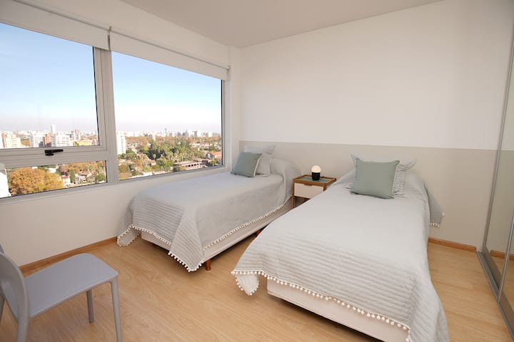 secondary bedroom overlooking the river and gardens