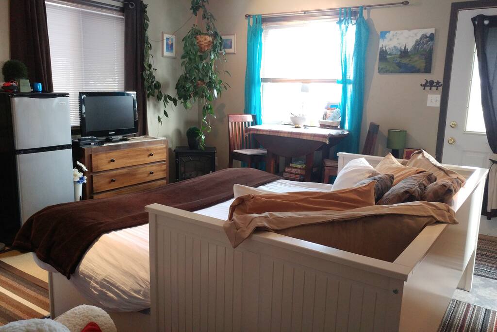 Sleeping, dining, living, kitchen all in one place :)