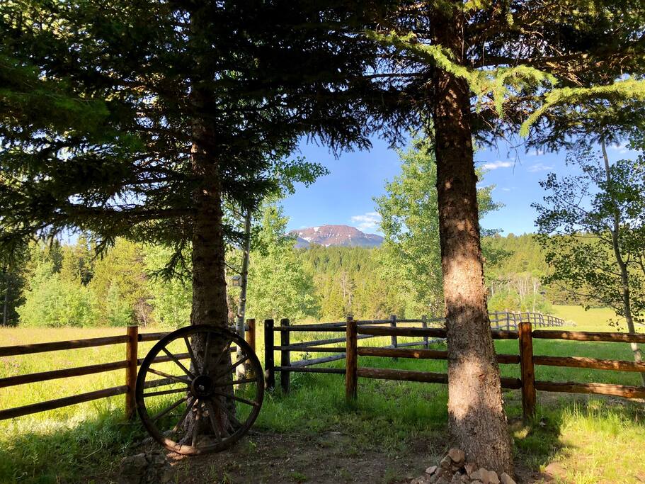 The beautiful view you get to wake up to every morning! This is viewing out of the back (large) A-frame windows! You get one of the best views of Mt. Sawtelle right from the family room!