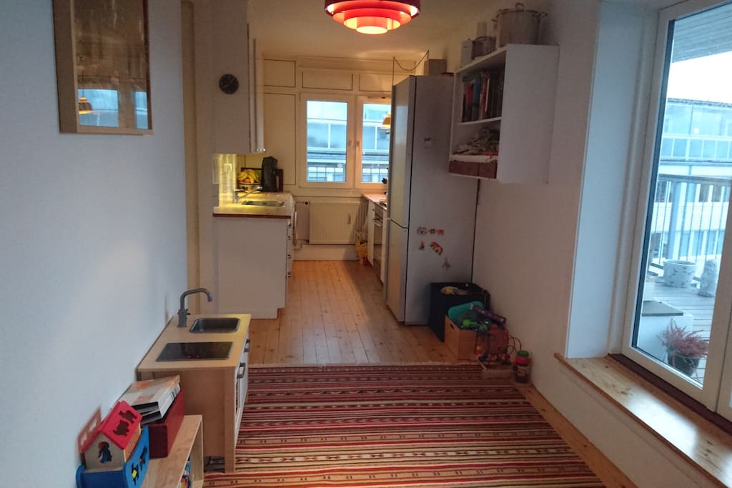 The kitchen in one end the dinning room/living room ensuite.