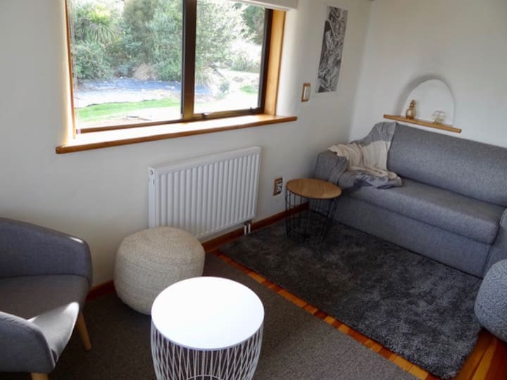 Lounge room with mountain view