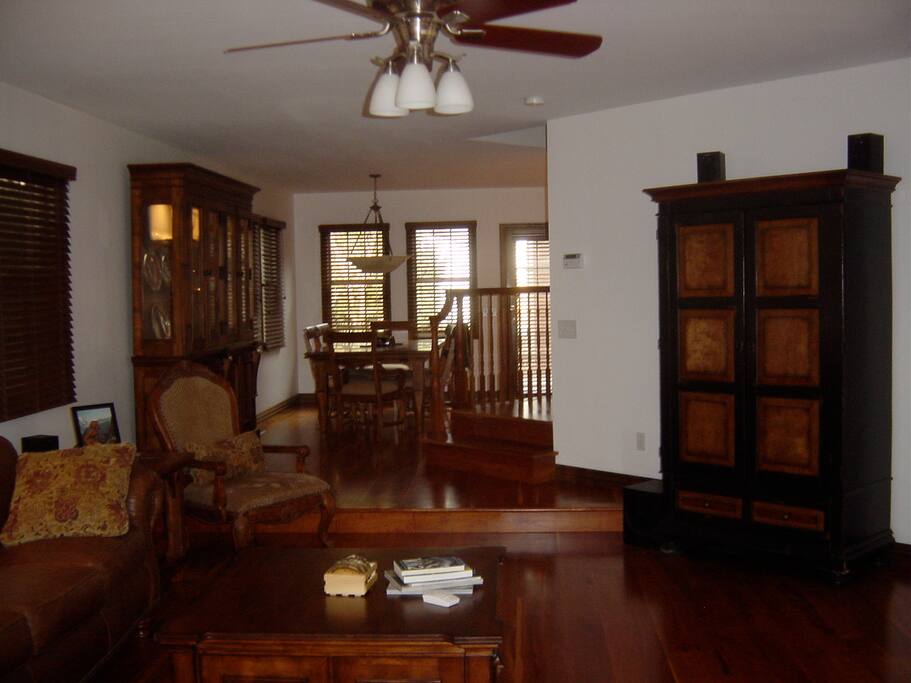 Looking at Dining Room from the Living Room. Armoir contains Sony smart TV and stereo system.