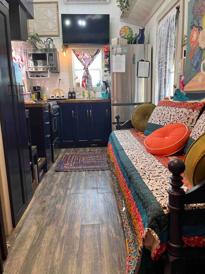 Sala de estar y área de cocina