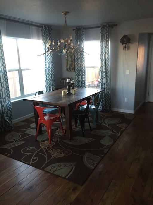 dining room with 6 chairs and highchair