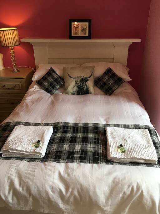 Double bed with a highland theme