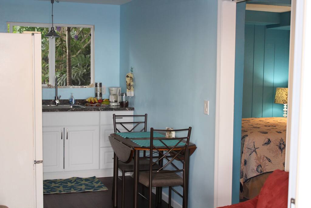 The dining table can seat two to four