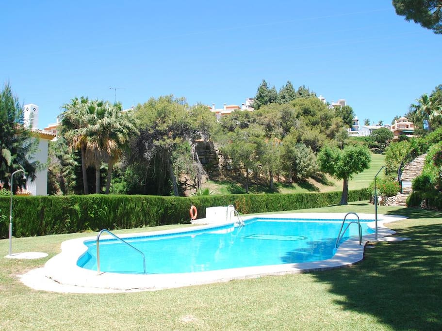 The smaller of the three pools in a quiet corner of the gardens.
