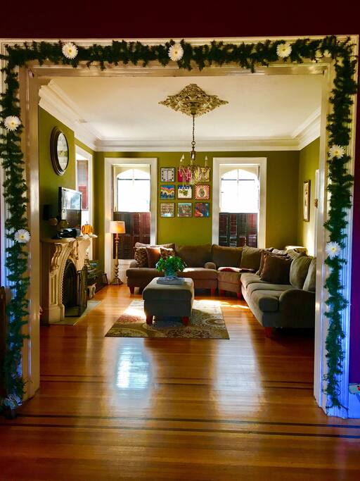 Giant living room with oversized couches. Perfect for movie night in front of the flat screen with surround sound!