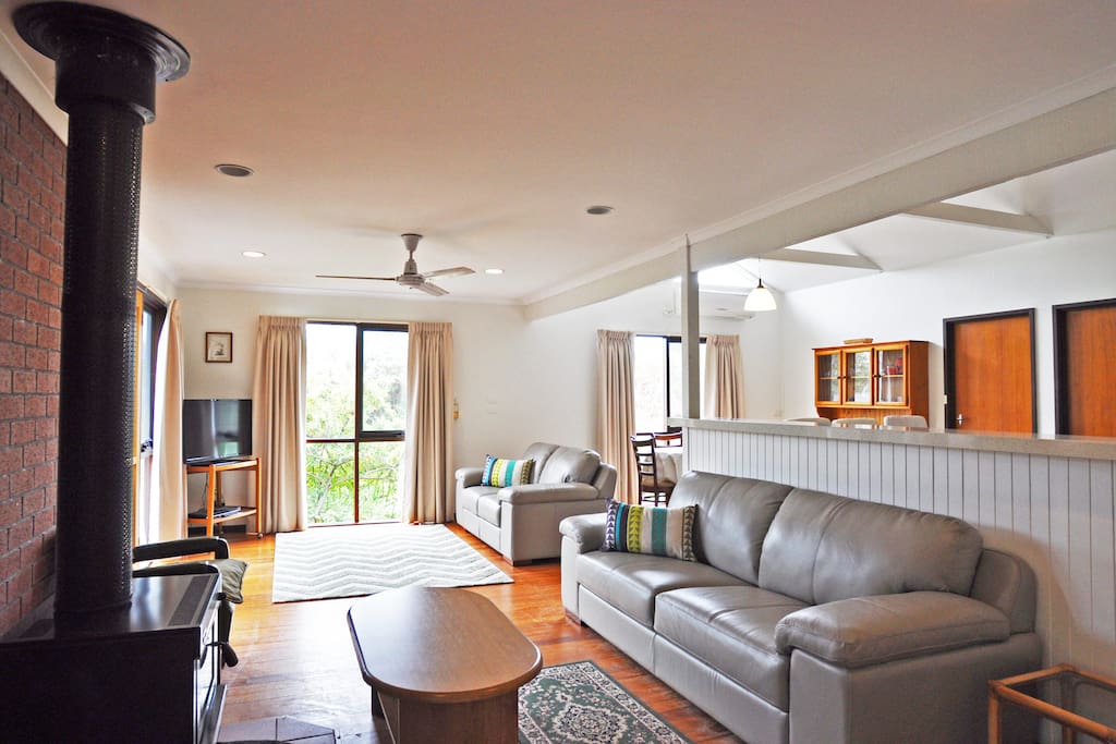 Relax in summer or winter with cozy and warm pot belly stove and reverse cycle airconditioning