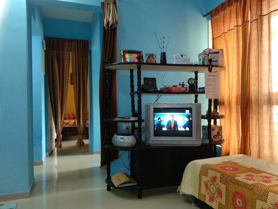 TV Set and Radio & CD Player for playing "Suprabhatram"