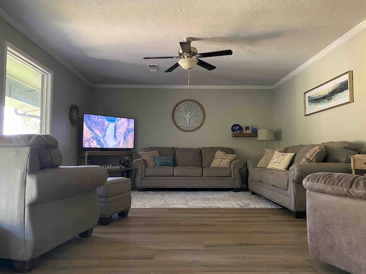 Plenty of comfy seats for everyone to gather or cozy up and relax