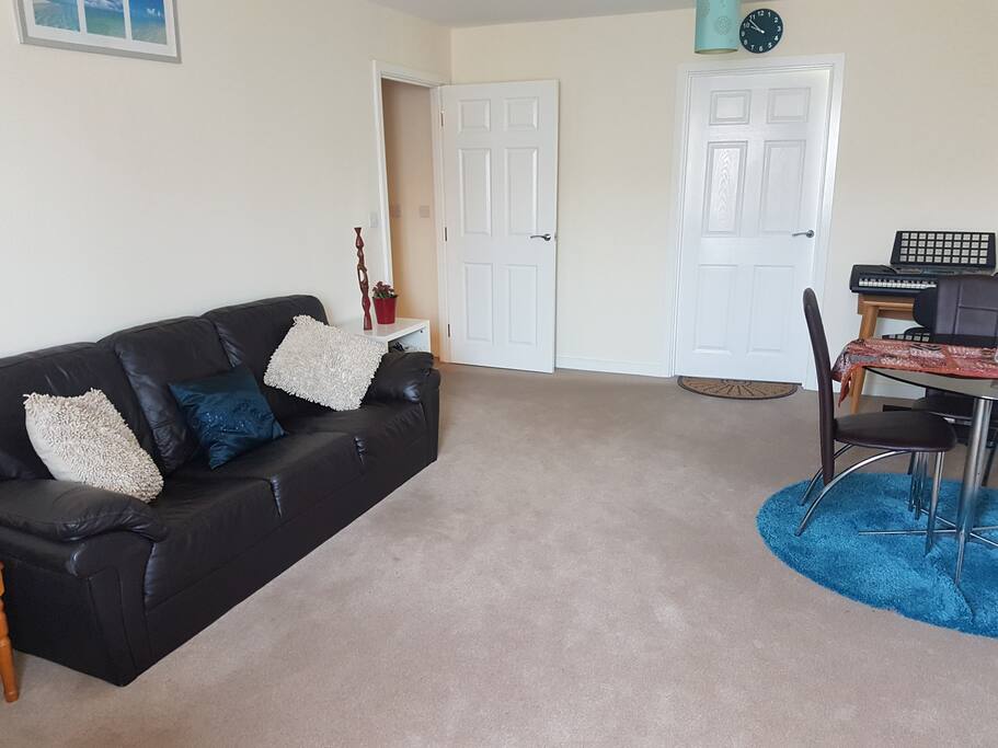 Spacious living room with dinner table