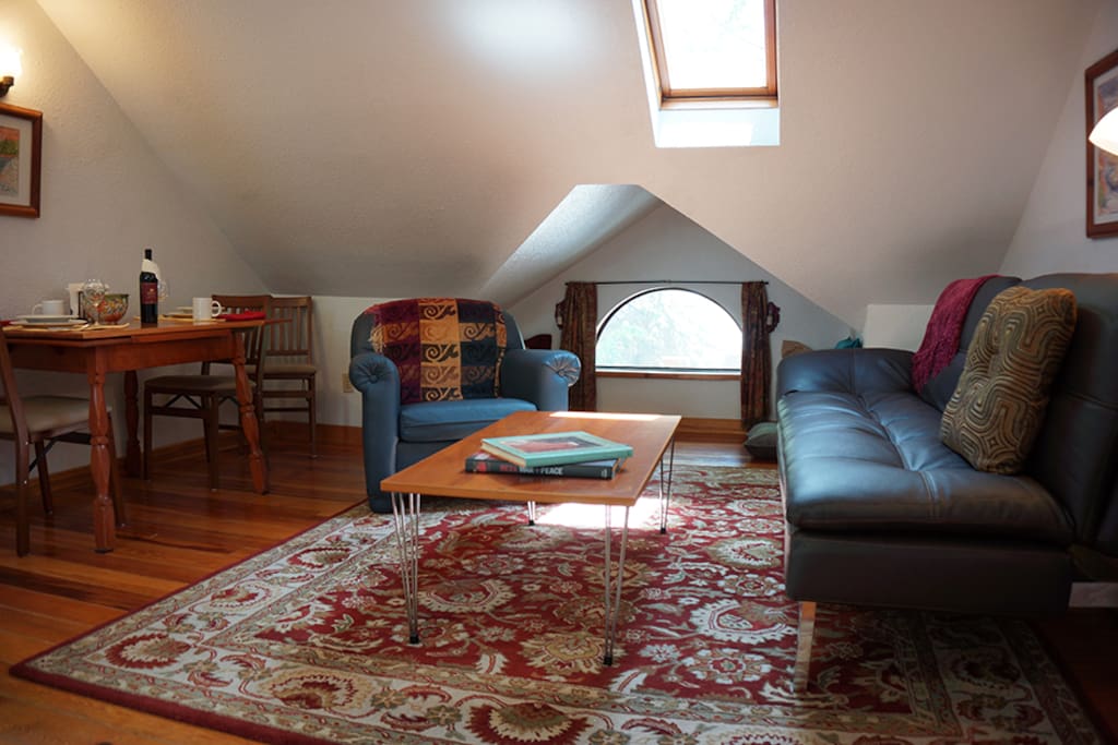 Living room open to dining and kitchen space