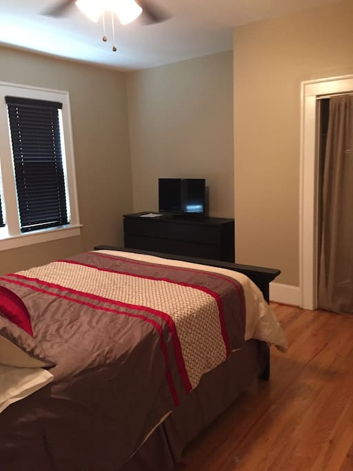 Dresser with plenty of storage along with a closet. TV has cable