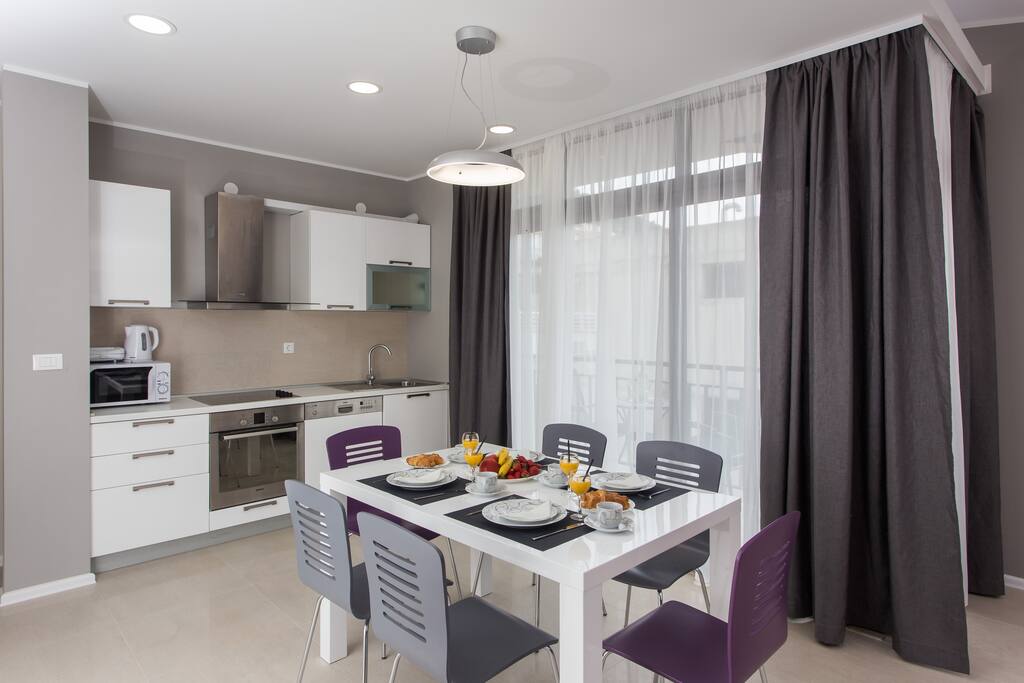 Deluxe Two-Bedroom Apartment with Balcony and City View