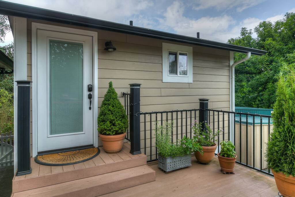 The Guest House is a private, separate structure, accessible from a shared deck.