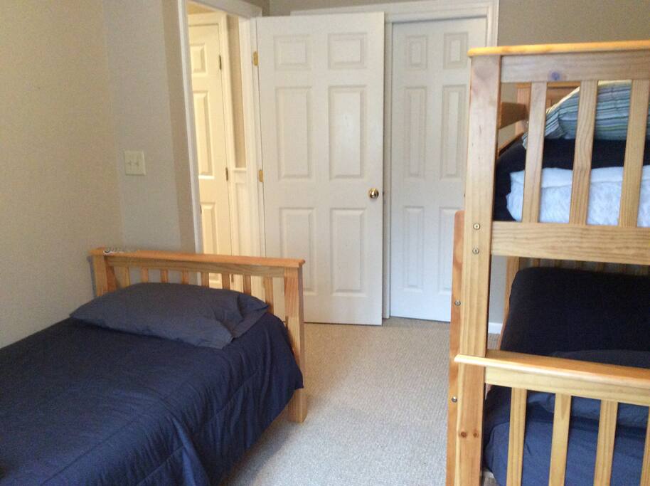 1st floor bedroom with 3 twin beds