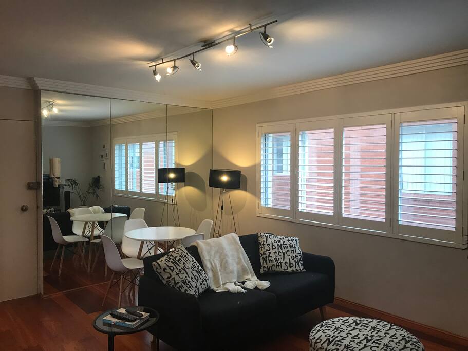 Long area with table and 4 chairs