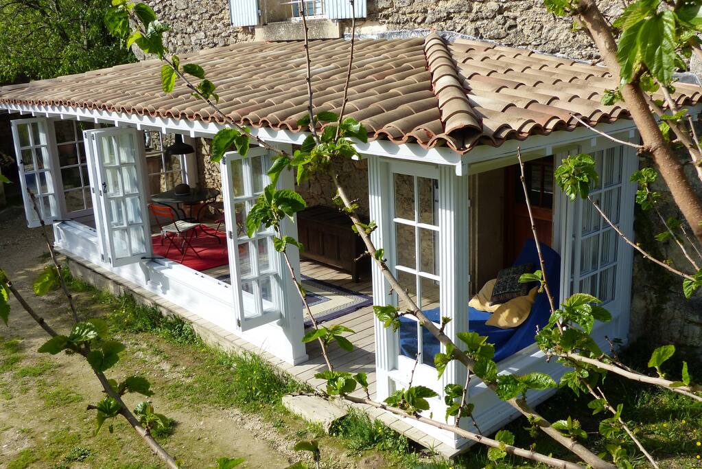 Terrace windows open fully on all sides.