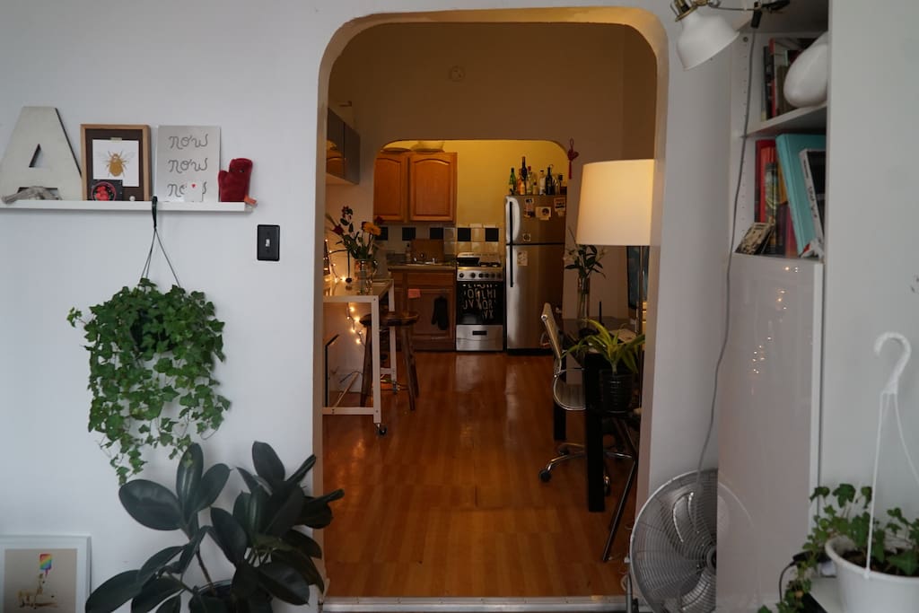 view from the living room towards the office and the kitchen