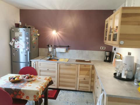 Room with private bathroom in detached house.