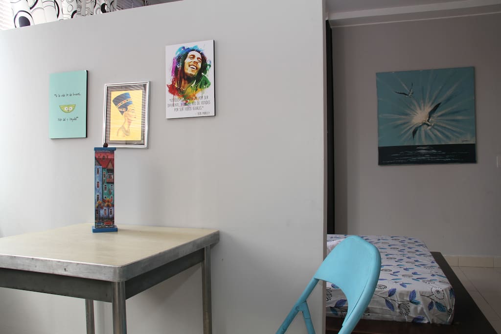 Loft studio with full equipped kitchenette, desk, double bed, private bathroom and table.
Roosevelt26.EscapeToCali.com