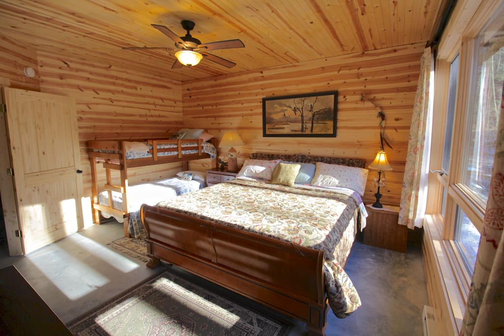 A King and set of Twin bunk beds in the Master bedroom