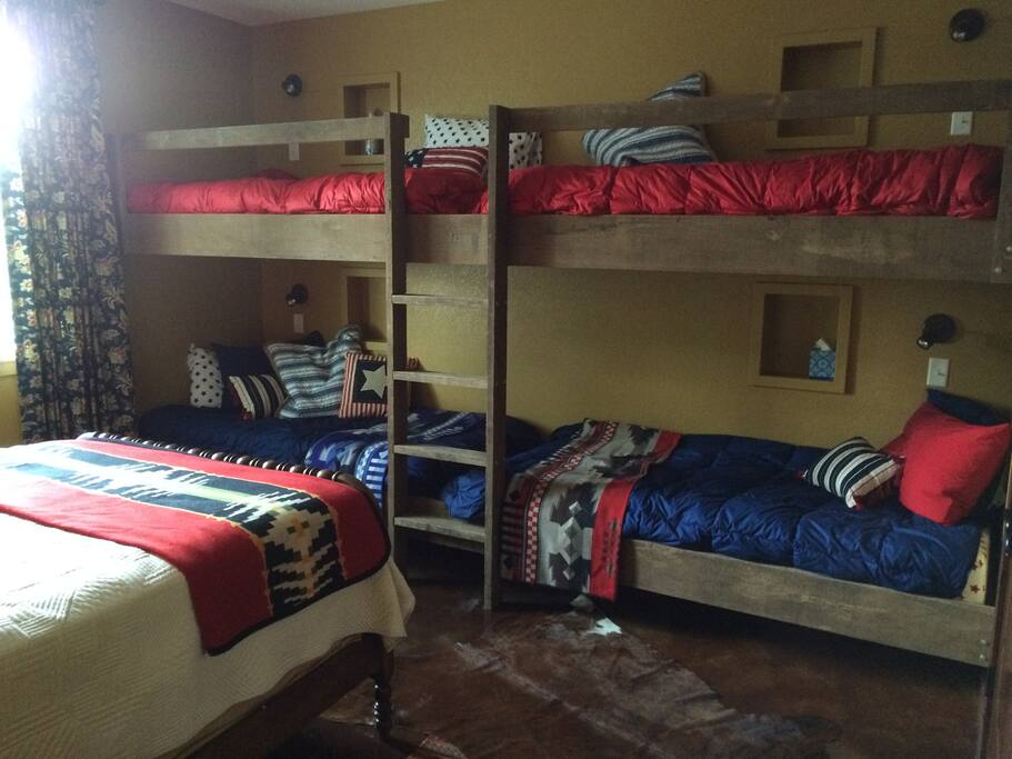 Double bunk beds, with 12" memory foam mattresses. Reading lights, too.