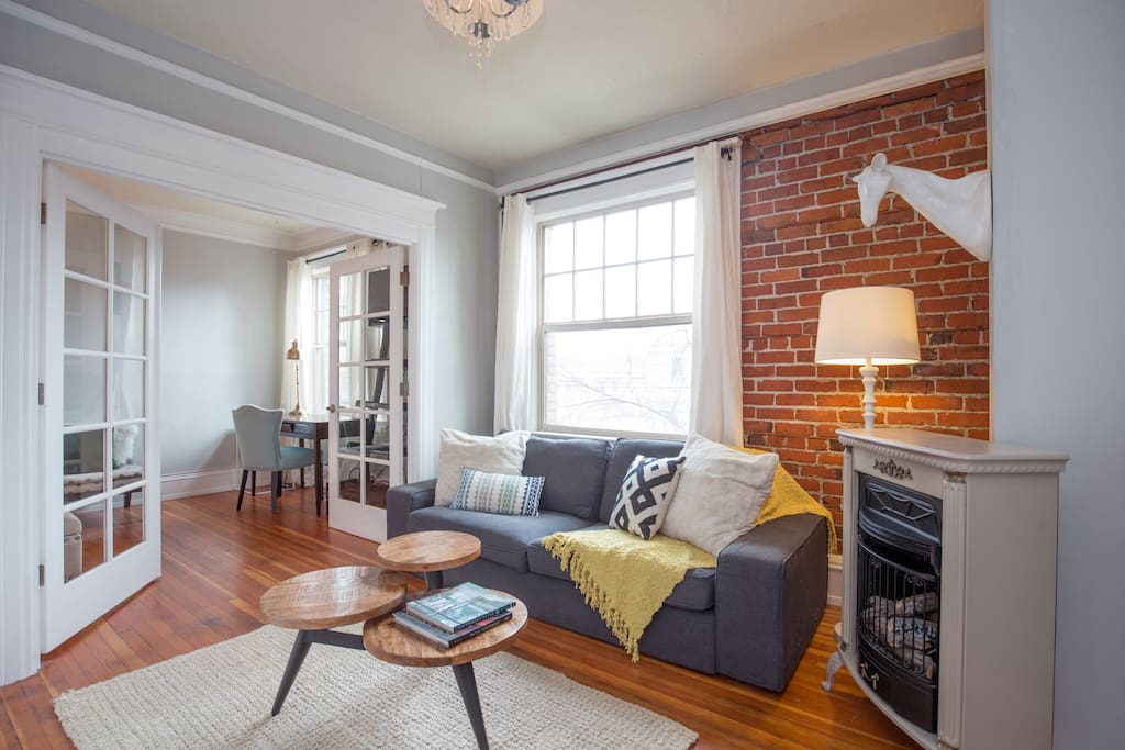 Living room with exposed brick