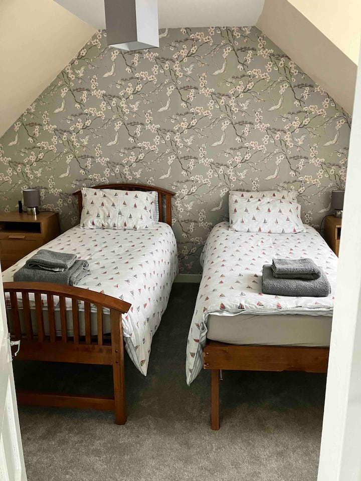 Habitación doble con dos dormitorios.