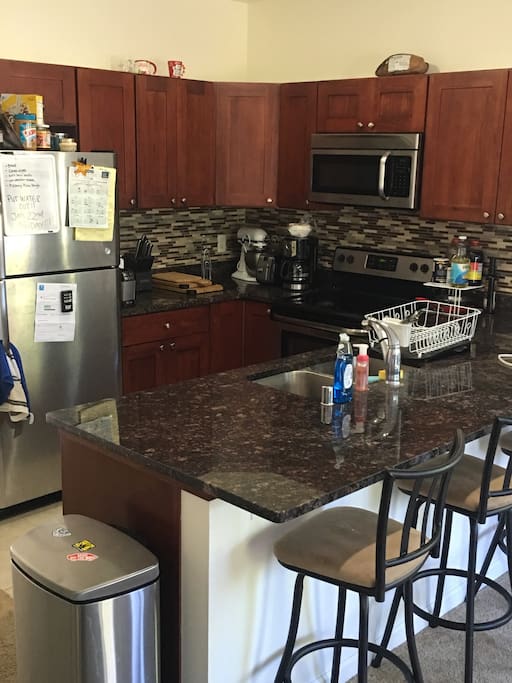 Shared Full kitchen available with bar and barstools