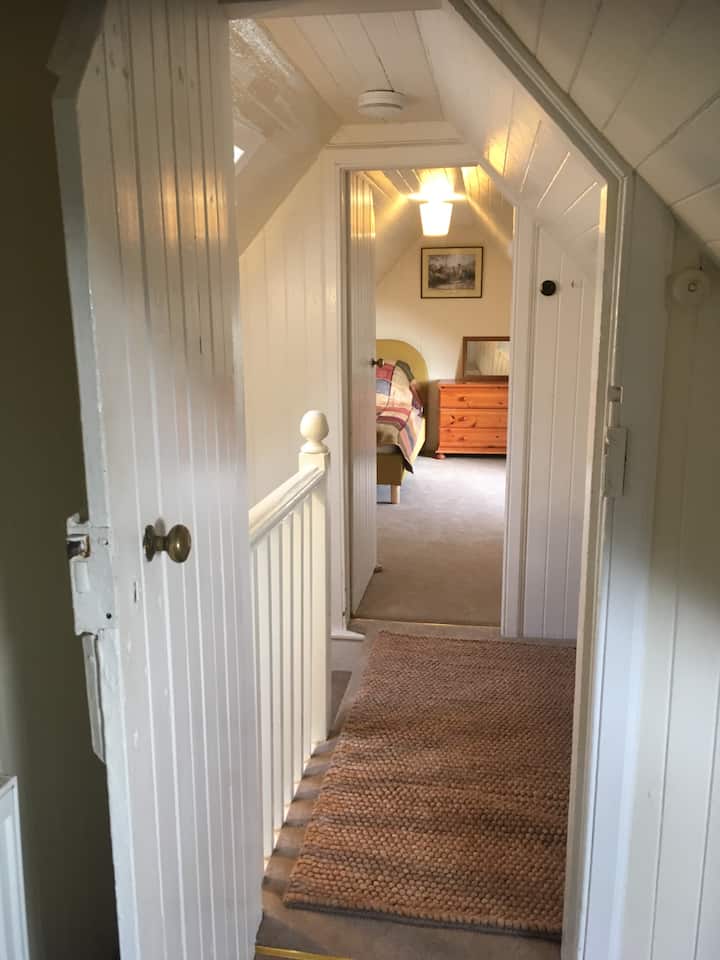 Upstairs landing looking towards the singe/child's room