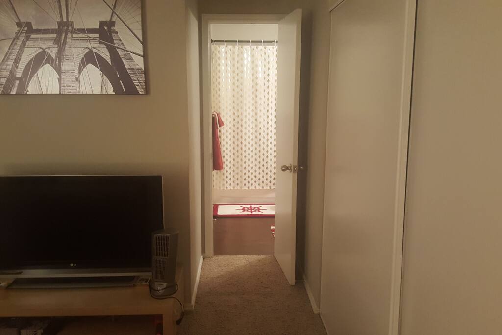 Entrance from bedroom 1 to bathroom 1