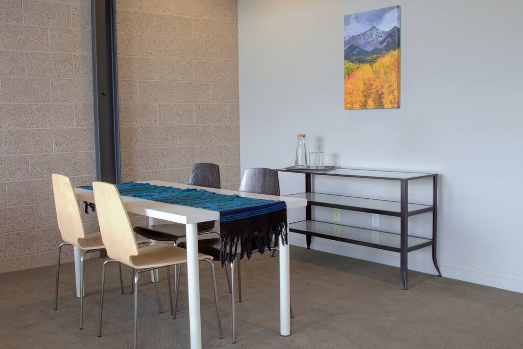 Table for four, perfect for enjoying a cup of coffee or to play some board games.