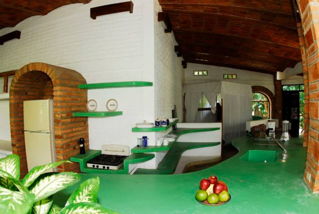kitchen and view of one of the beds