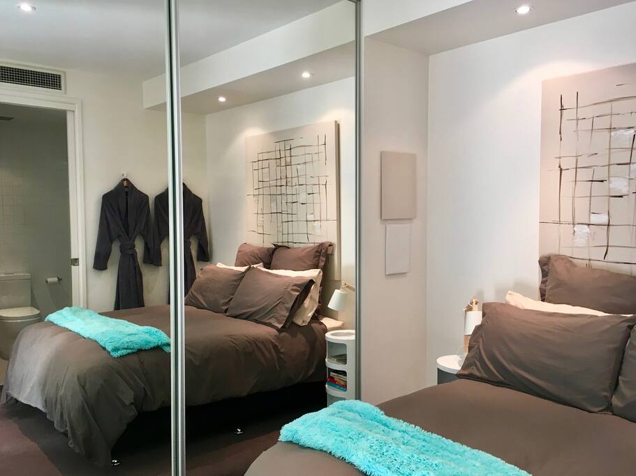 Brand new Miracoil pillow top bed ensemble, with feather and down doona, plenty of pillows, and the softest linen in the world.