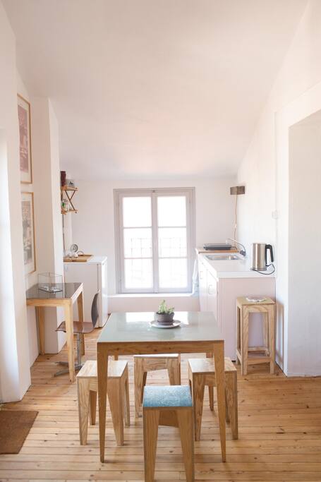 View into the dining/kitchen from the living room