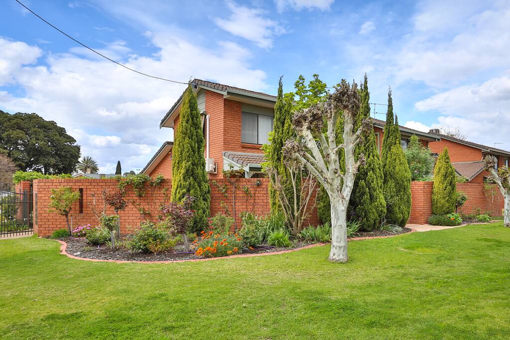 Spacious well fenced garden surrounds