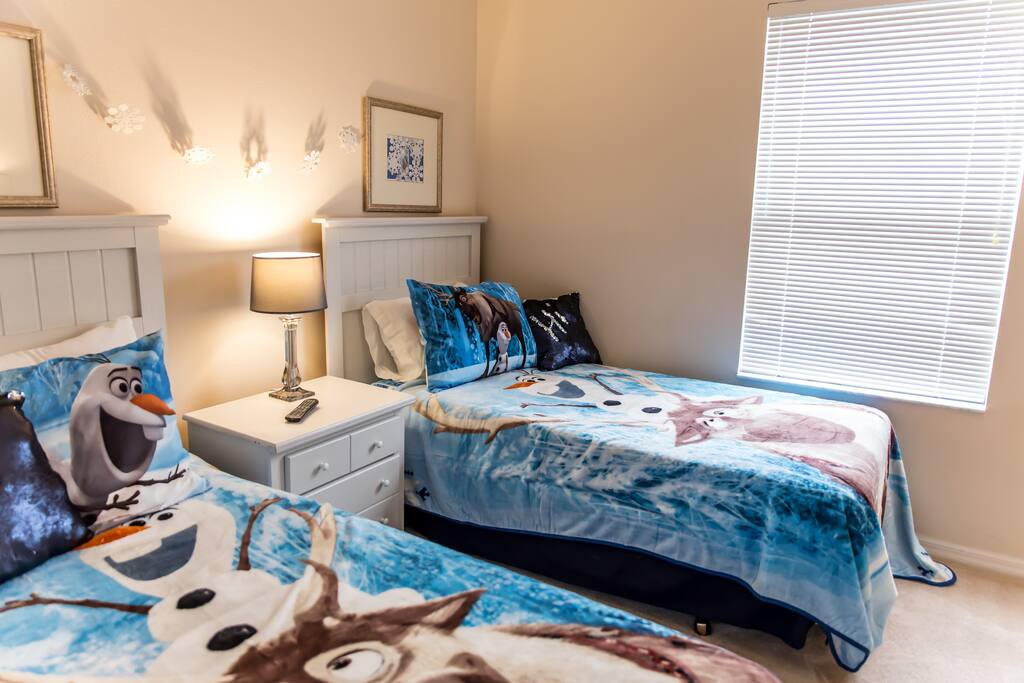Kids bedroom on second floor, 2 twin beds and a TV