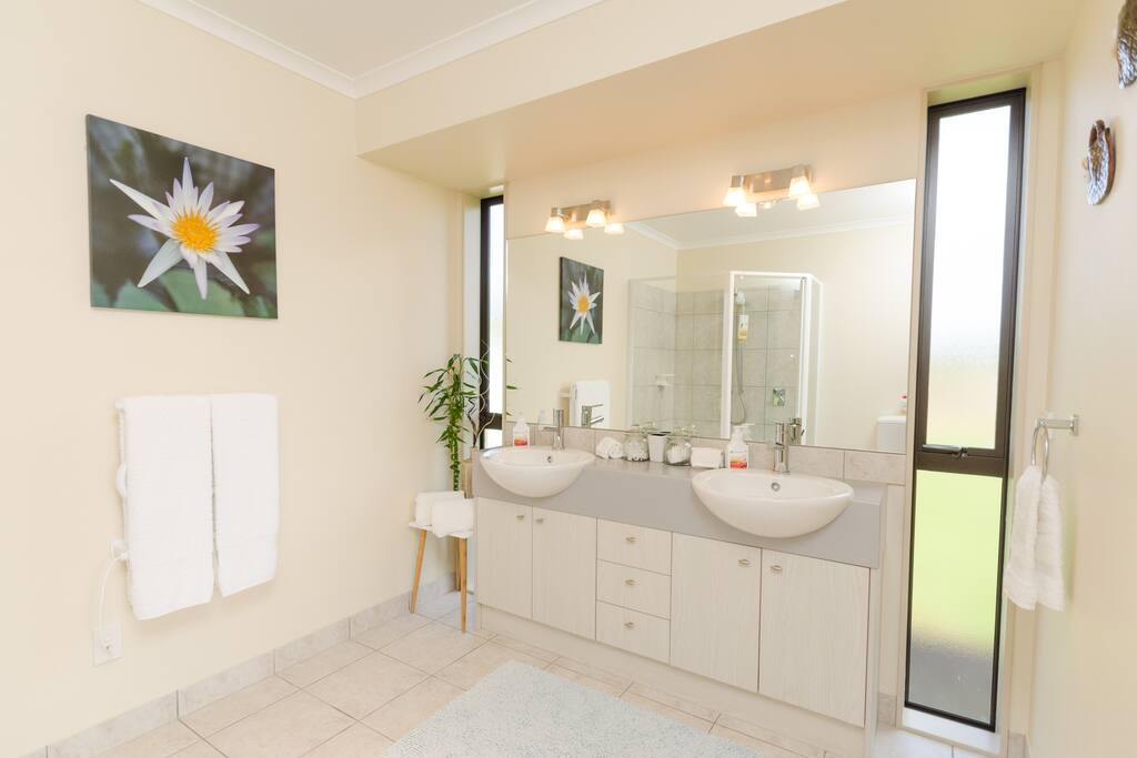 Large bathroom with double basin vanity