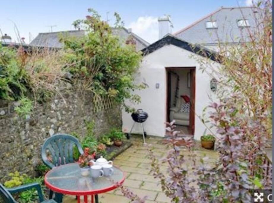 private patio attached to open garden area