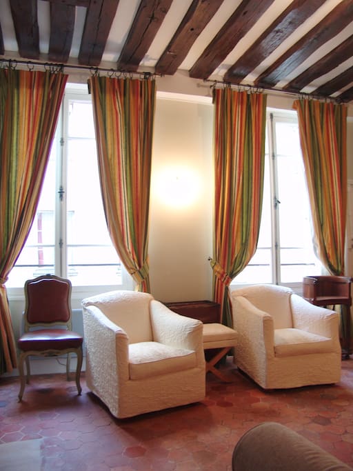 Large French Windows overlooking quiet courtyard