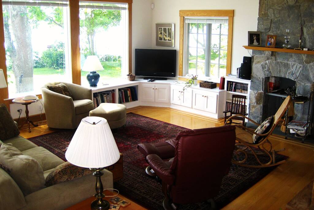Great room features incredible ocean views and gorgeous stone fireplace.