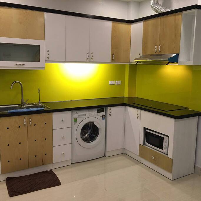 Kitchen, cupboard, microwave, washing machine