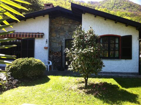 Ferienhaus Luganersee at ground level  with a private beach