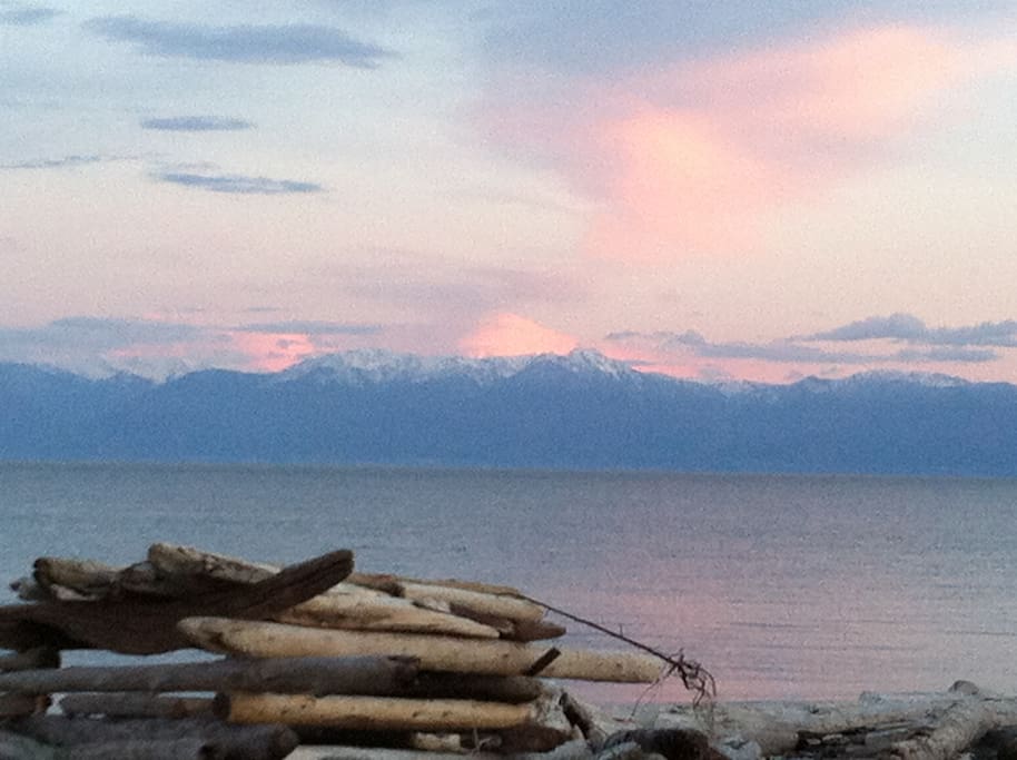 Wake up to this view of the Olympic mountains across from Parry Bay.