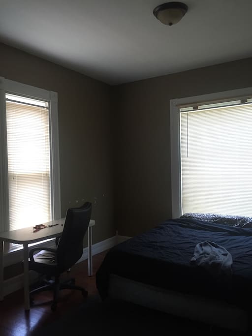 Lots of light in the room. Desk with chair if anybody needs to work on something.