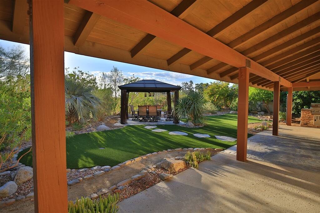 Large Veranda Patio in Relaxing Custom Backyard
