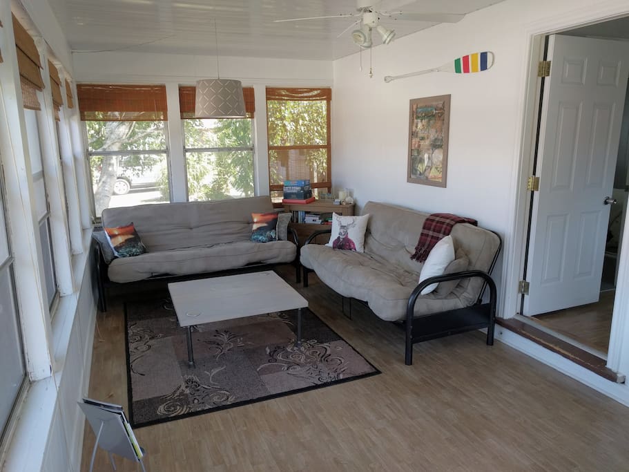 Front sun room. 2 futons pull out to double beds.