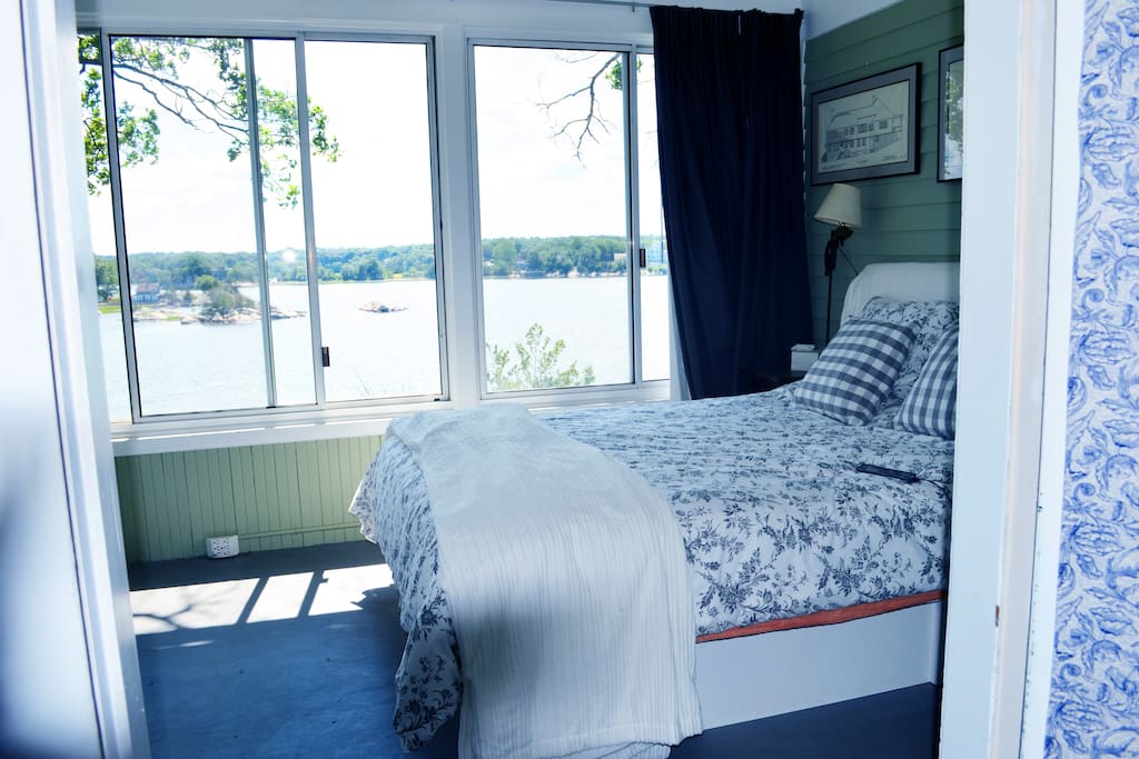 Master bedroom has two glass walls with an incredible view.